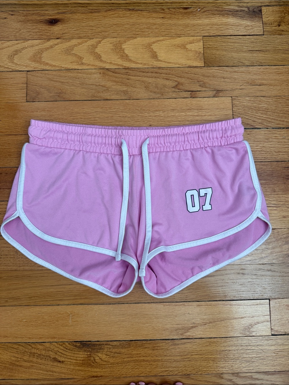 Women’s Pink Athletic Drawstring Shorts with White Trim and '07 Detail